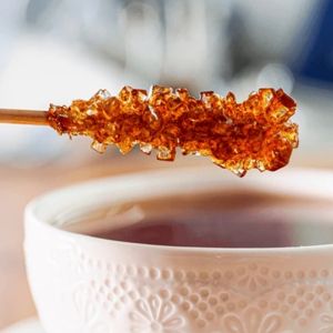 Zahăr Candel Brun pe Băț – Îndulcitor Elegant cu Note de Caramel